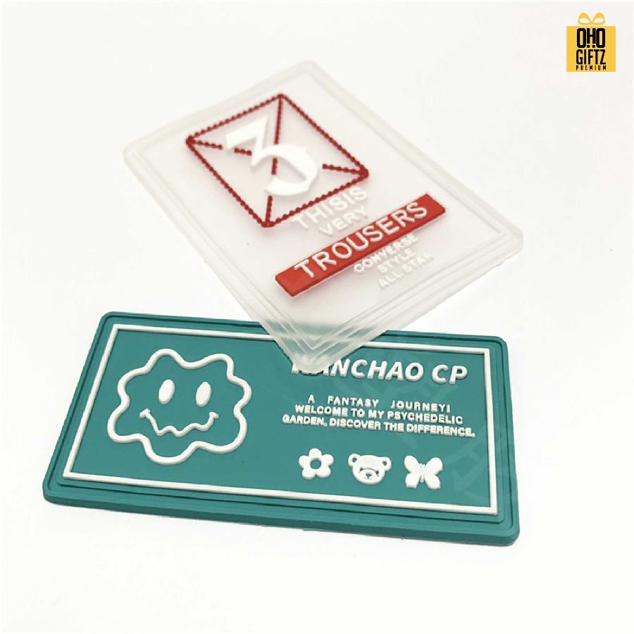 รับผลิตป้ายแท็กยางติดเสื้อ กระเป๋า สกรีนโลโก้ ทำเป็นของพรีเมี่ยม ของชำร่วยได้