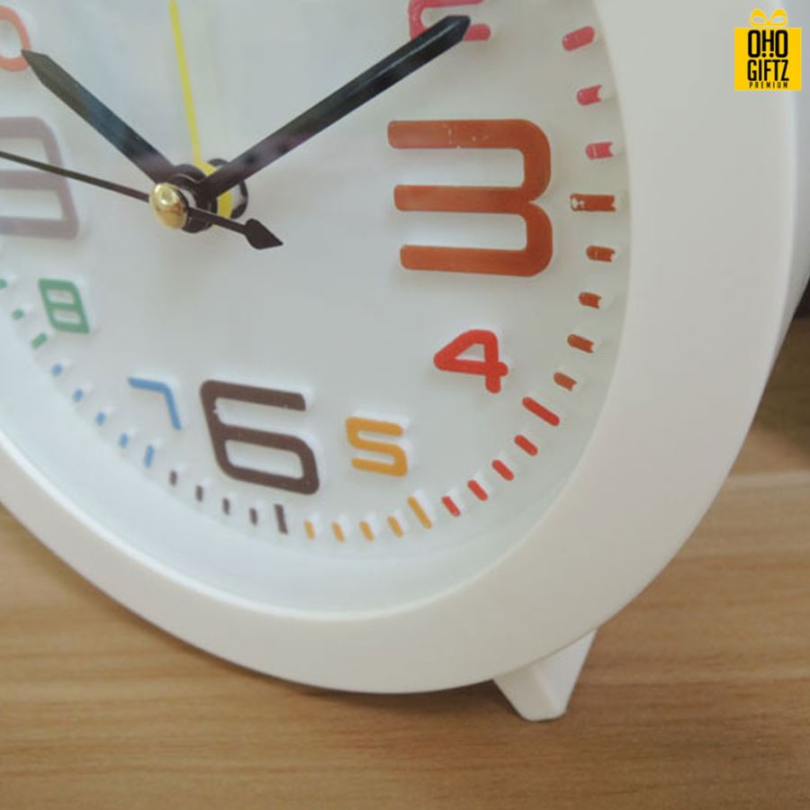นาฬิกาตั้งโต๊ะทรงกลมสีลูกกวาด สกรีนโลโก้ ทำเป็นของพรีเมี่ยมได้