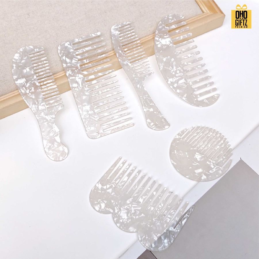 หวีพลาสติกลายหินอ่อน สกรีนโลโก้ ทำเป็นของพรีเมี่ยมได้