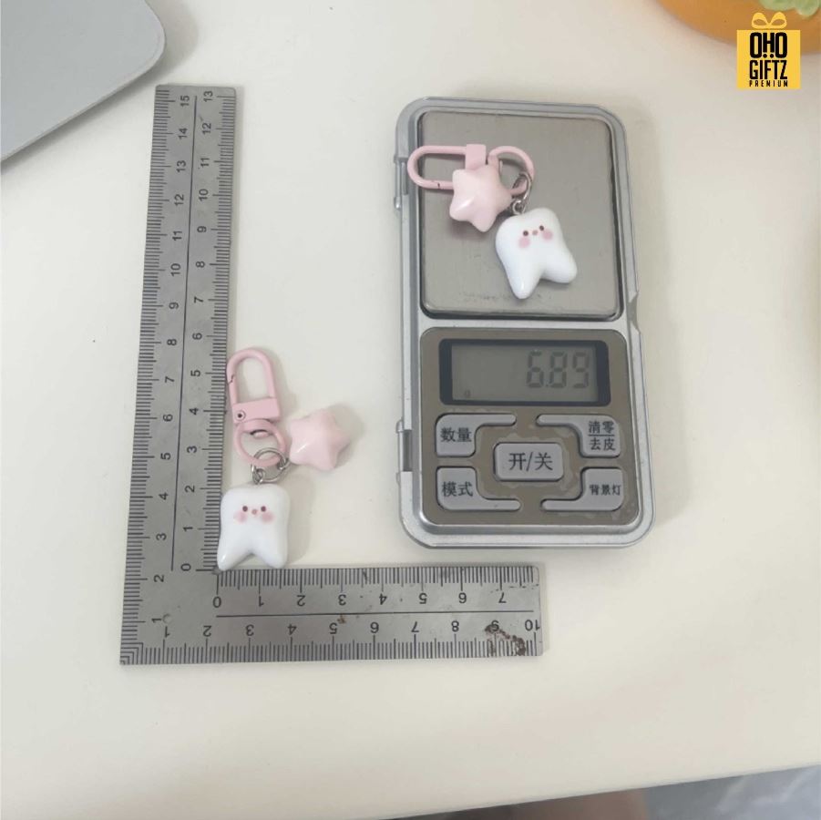 พวงกุญแจฟันน่ารัก สกรีนโลโก้ ทำเป็นของพรีเมี่ยม ของชำร่วยได้